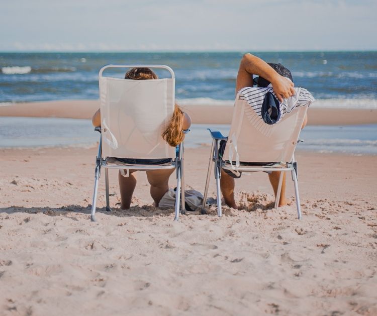 Couple on the beach financial wellbeing